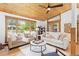 Spacious living room featuring two couches, a large window, and hardwood ceiling and flooring at 270 31St St, Boulder, CO 80305