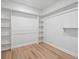Spacious walk-in closet with ample shelving and rod space, offering plenty of room for organized storage at 61800 E 32Nd Ct, Strasburg, CO 80136