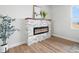 Modern fireplace with elegant stone surround, providing a cozy focal point in the room at 61800 E 32Nd Ct, Strasburg, CO 80136