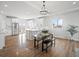 Gourmet kitchen featuring white cabinets, stainless steel appliances, and large island at 61800 E 32Nd Ct, Strasburg, CO 80136