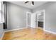 This bedroom has hardwood flooring, and neutral walls. It also offers access to the ensuite bathroom at 2724 Federal Blvd # 2, Denver, CO 80211