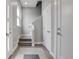 Entryway features tile flooring, staircase and access to other rooms at 2724 Federal Blvd # 2, Denver, CO 80211