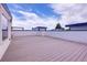 Spacious rooftop deck with views of neighborhood on a sunny day at 2724 Federal Blvd # 2, Denver, CO 80211