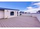 Spacious rooftop deck with views of neighborhood on a sunny day at 2724 Federal Blvd # 2, Denver, CO 80211