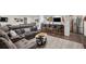 Spacious basement with a wet bar, seating area, and recreational space, perfect for entertaining at 8815 S Tibet Ct, Aurora, CO 80016