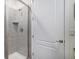 Contemporary bathroom featuring a glass-enclosed shower with sleek gray tiling and modern fixtures at 8815 S Tibet Ct, Aurora, CO 80016