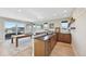 Bright game room with wet bar area and walk out to rooftop deck at 9006 E 60Th Ave, Denver, CO 80238