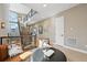 Bright, open living area with staircase and modern decor for comfortable and stylish living at 9006 E 60Th Ave, Denver, CO 80238