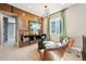 Comfortable seating area with a modern TV and stylish decor at 9006 E 60Th Ave, Denver, CO 80238