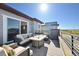 Expansive roof deck with outdoor seating and neighborhood views at 9006 E 60Th Ave, Denver, CO 80238
