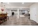 Open basement with a wet bar and plenty of space for relaxing and entertaining at 15205 W Iliff Ave, Lakewood, CO 80228