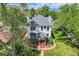 Aerial view of a classic home with lush green lawn, and a charming front porch at 5127 Lowell Blvd, Denver, CO 80221