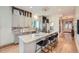 Modern kitchen with granite countertops and bar stool seating at 5127 Lowell Blvd, Denver, CO 80221