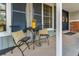 Inviting front porch with seating area and seasonal decorations offers a cozy welcome at 6918 E Easter Pl, Centennial, CO 80112