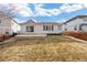 Backyard featuring a patio, lawn area, and mature landscaping at 2085 Cactus Bloom Ct, Castle Rock, CO 80109