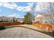 Spacious backyard with a patio and wood fence, offering privacy at 2085 Cactus Bloom Ct, Castle Rock, CO 80109