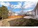 Backyard features stamped concrete patio and landscaped yard with privacy fence at 2085 Cactus Bloom Ct, Castle Rock, CO 80109