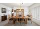 Cozy dining room with wood table, chairs, and a large china cabinet at 2085 Cactus Bloom Ct, Castle Rock, CO 80109