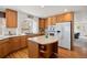 Spacious kitchen with an island, stainless steel appliances, and plenty of cabinet space at 2085 Cactus Bloom Ct, Castle Rock, CO 80109