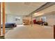 Unfinished basement with exposed beams and window, ready for your creative ideas at 7763 S Elk St, Aurora, CO 80016