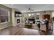 Comfortable living room featuring a fireplace, large windows, and stylish furnishings at 7763 S Elk St, Aurora, CO 80016