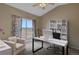 Bedroom with sloped ceiling set up as an office space at 1343 Villa Grv, Monument, CO 80132