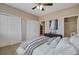 Bedroom with carpet, multiple closets, and staged decor at 1343 Villa Grv, Monument, CO 80132