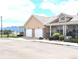 Charming home featuring a two-car garage, inviting front porch, and well-maintained landscaping at 1343 Villa Grv, Monument, CO 80132