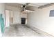 Spacious garage featuring overhead storage, built-in cabinets, and a practical door to the house at 1343 Villa Grv, Monument, CO 80132