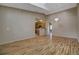 Bright living room features hardwood floors, chandelier, and an open floor plan at 1343 Villa Grv, Monument, CO 80132