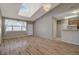 Bright living room features hardwood floors, vaulted ceilings, and an open floor plan at 1343 Villa Grv, Monument, CO 80132