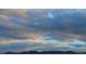 Clouds over mountains at 1343 Villa Grv, Monument, CO 80132