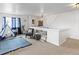 Bright bonus room with comfortable seating, natural light, and neutral carpet at 2468 Candleglow St, Castle Rock, CO 80109