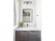 Bathroom vanity area with a gray cabinet and elegant countertops at 5917 Black Forest Dr, Elizabeth, CO 80107