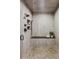 Walk-in shower with pebble floors, a bench, and modern hardware at 5917 Black Forest Dr, Elizabeth, CO 80107