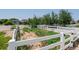 Enclosed vegetable garden with white fencing and rich soil ready for planting at 7126 E 162Nd Ct, Brighton, CO 80602
