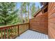 Spacious outdoor balcony surrounded by lush greenery at 1152 Ski Hill Rd, Breckenridge, CO 80424