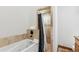 Bathroom featuring a soaking tub and tiled shower at 1152 Ski Hill Rd, Breckenridge, CO 80424