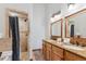 Bathroom with double vanity, granite countertop and shower at 1152 Ski Hill Rd, Breckenridge, CO 80424