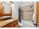 Bathroom with granite countertops, a shower-tub, and modern fixtures at 1152 Ski Hill Rd, Breckenridge, CO 80424