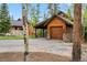 Exterior view of a wooden garage with a covered parking space at 1152 Ski Hill Rd, Breckenridge, CO 80424