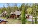 Picturesque mountain home nestled among tall trees, offering a serene and private retreat at 1152 Ski Hill Rd, Breckenridge, CO 80424