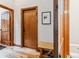 Hallway features wood floors, wood trim, and bench seating at 1152 Ski Hill Rd, Breckenridge, CO 80424