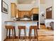 Cozy kitchen with breakfast bar and access to living space at 1152 Ski Hill Rd, Breckenridge, CO 80424