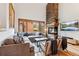 Inviting living room with stone fireplace and plush seating at 1152 Ski Hill Rd, Breckenridge, CO 80424