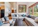 Relaxing living room featuring a large sectional sofa and cozy decor at 1152 Ski Hill Rd, Breckenridge, CO 80424