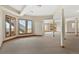 Basement with neutral walls, carpet, and large windows providing natural light and views at 132 Loveland Way, Golden, CO 80401
