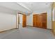 Spacious bedroom with neutral walls and carpet features a large closet and backyard views at 132 Loveland Way, Golden, CO 80401