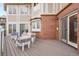 Outdoor deck features seating area with brick exterior views at 132 Loveland Way, Golden, CO 80401