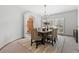 Formal dining room with neutral decor, a chandelier, and ample natural light at 132 Loveland Way, Golden, CO 80401
